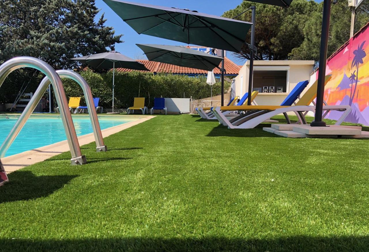 Hotel Des 4 Vents "Esprit Camargue" Aigues-Mortes Bagian luar foto