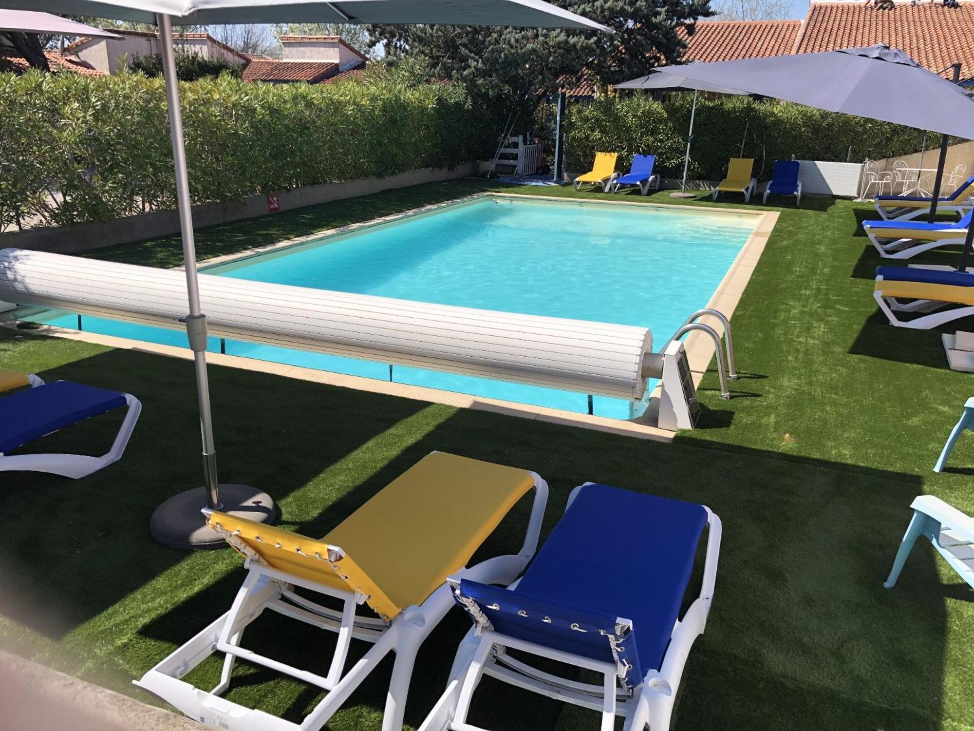 Hotel Des 4 Vents "Esprit Camargue" Aigues-Mortes Bagian luar foto