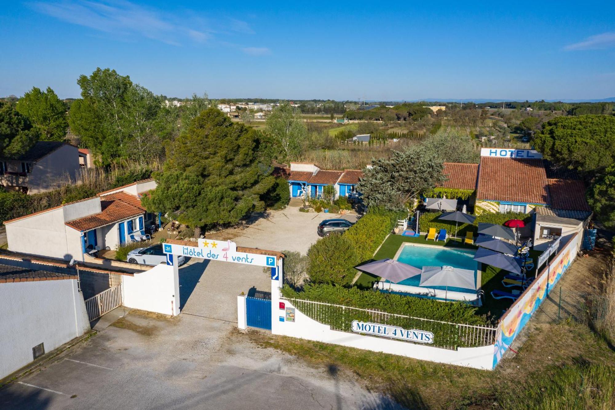 Hotel Des 4 Vents "Esprit Camargue" Aigues-Mortes Bagian luar foto