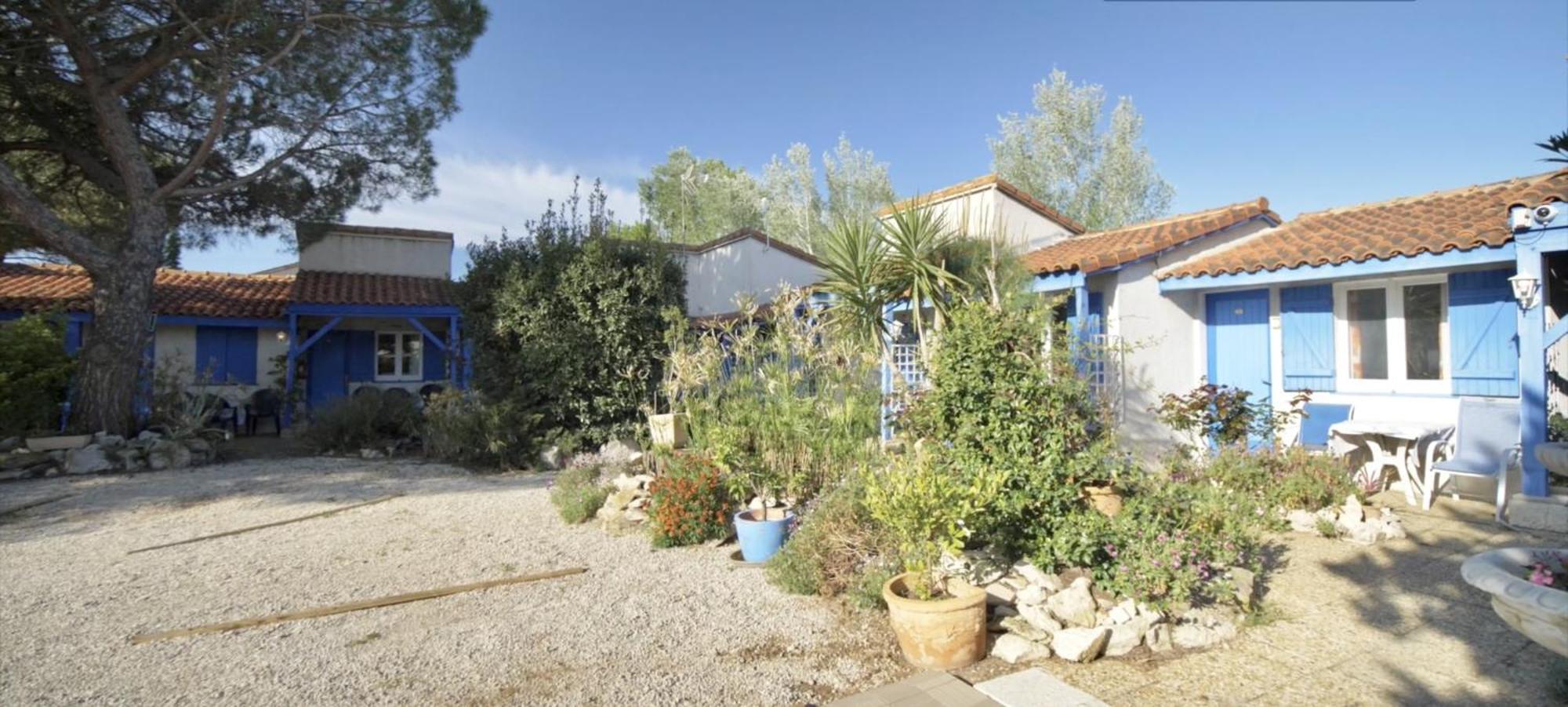 Hotel Des 4 Vents "Esprit Camargue" Aigues-Mortes Bagian luar foto